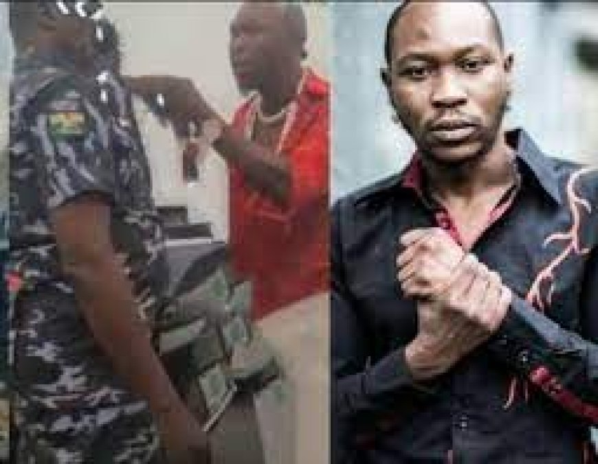 Police Handcuffs Seun Kuti After Surrendering Himself Over Assault On Police Officer